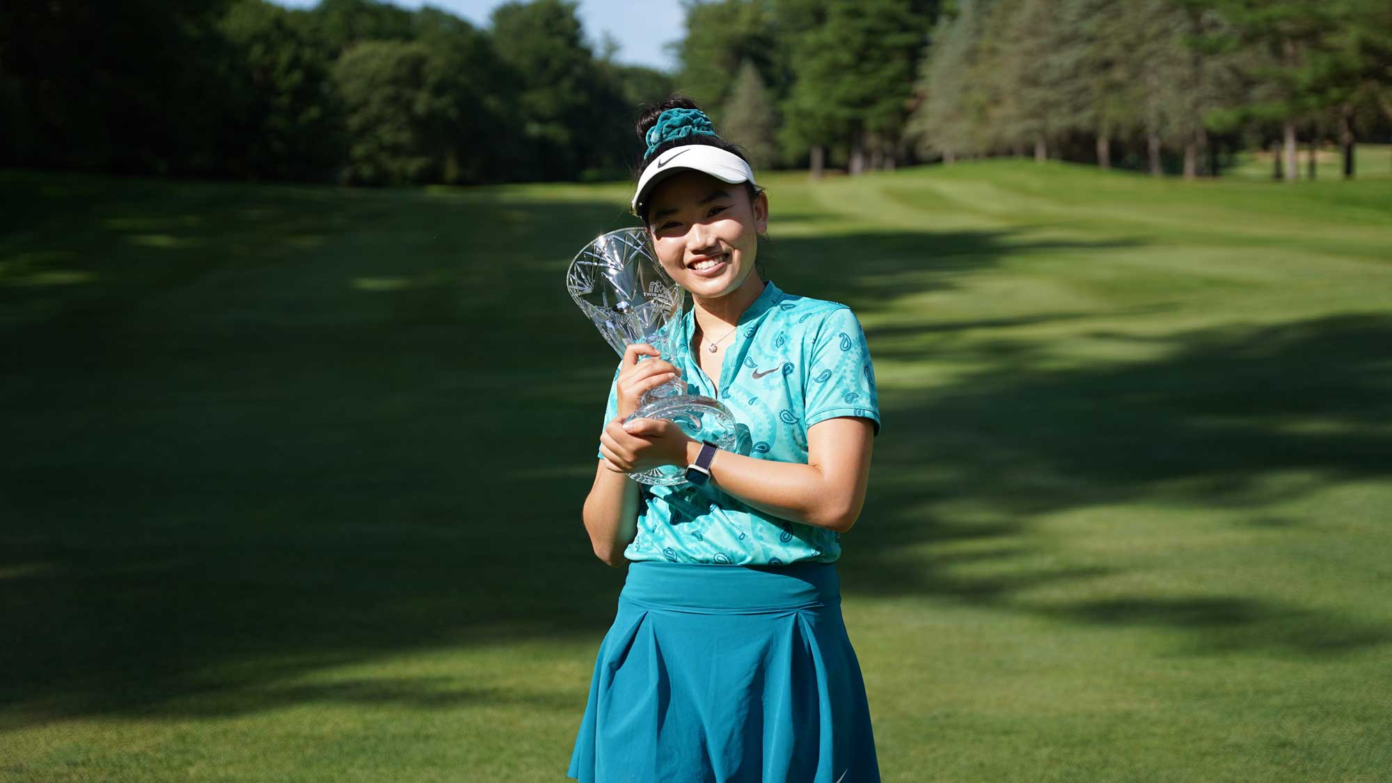 lucy-li_hugging-trophy.jpg