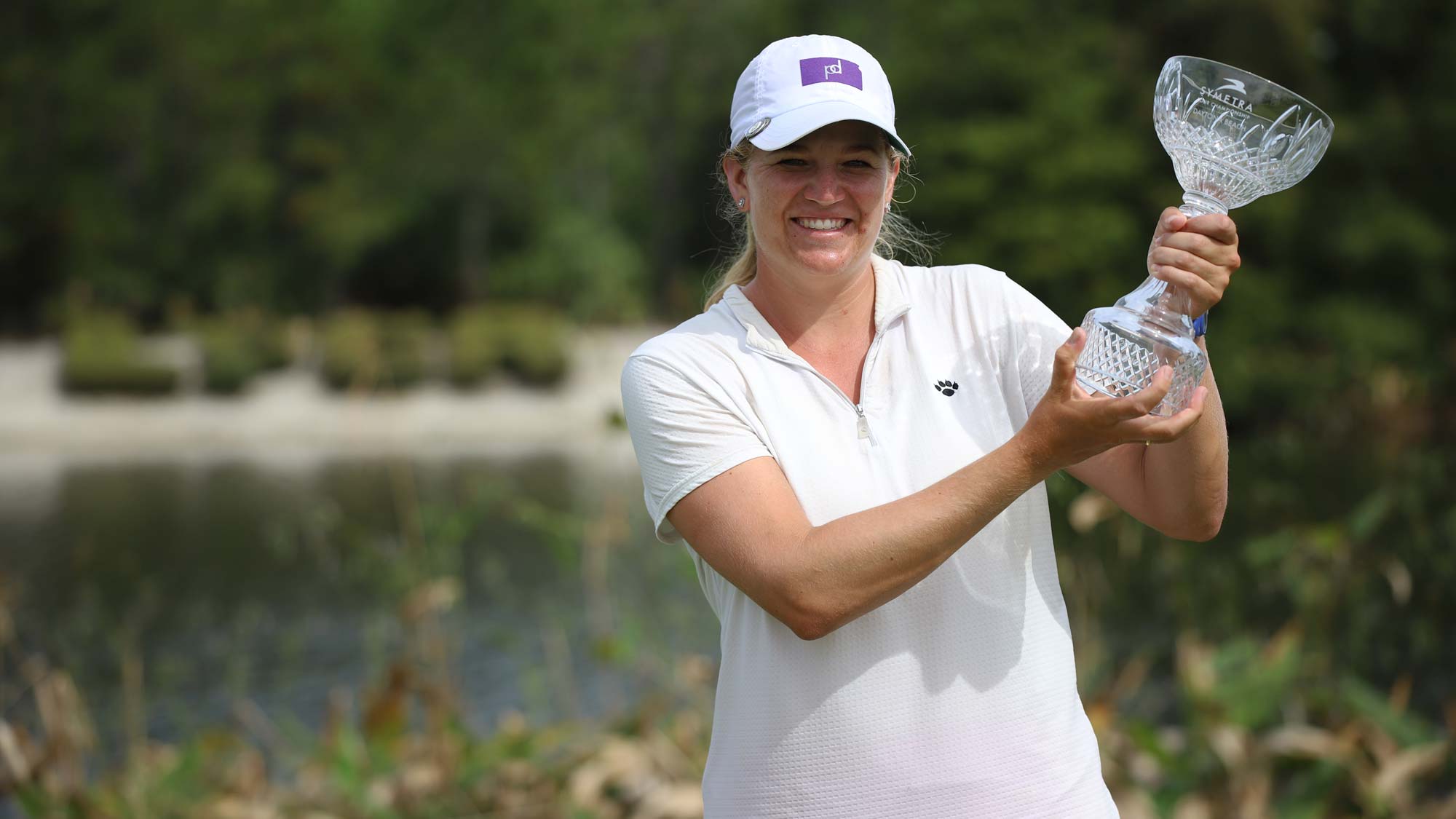 Laura Wearn raises trophy