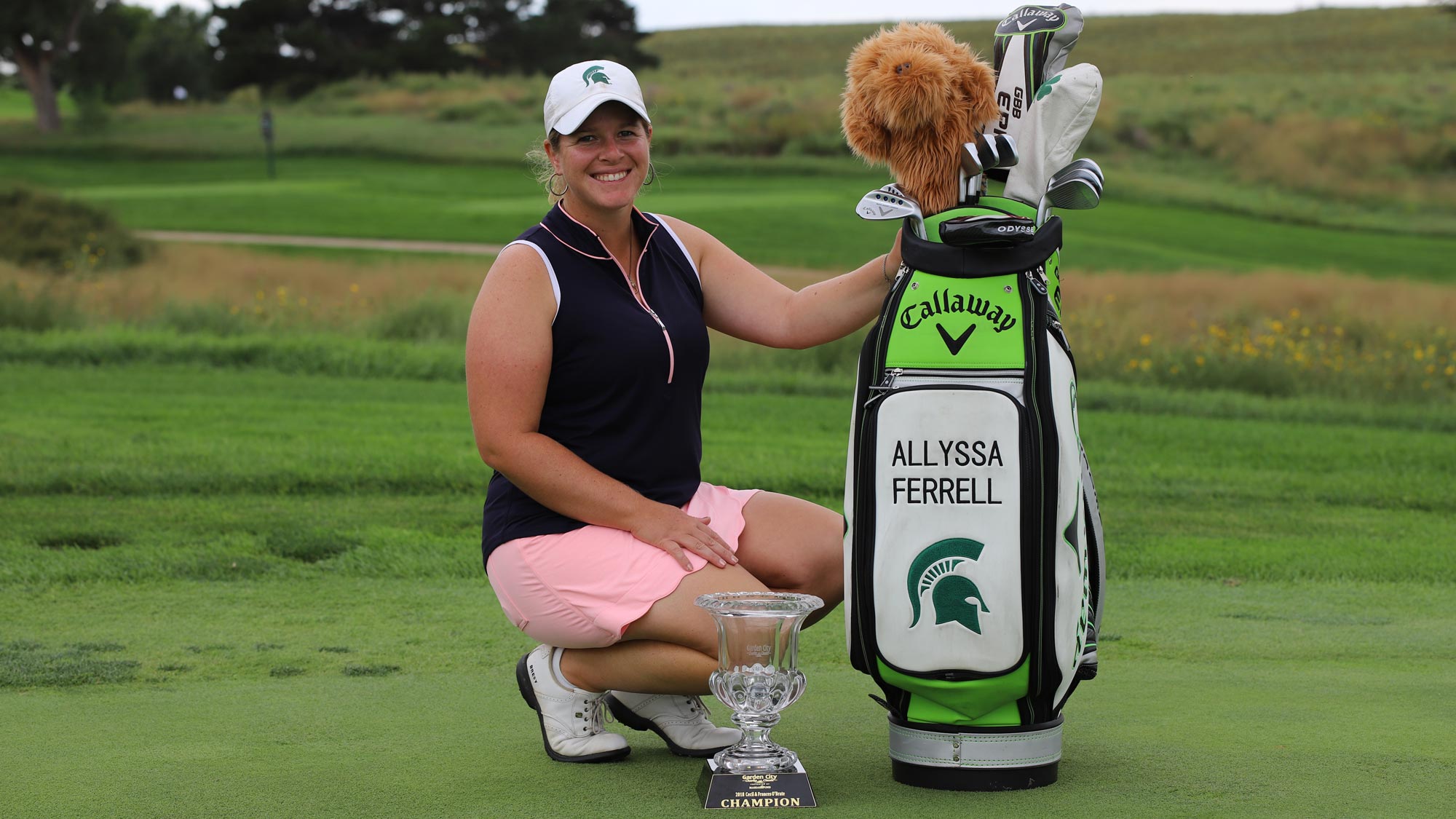 allyssa-ferrell-with-trophy-and-bag-2.jpg