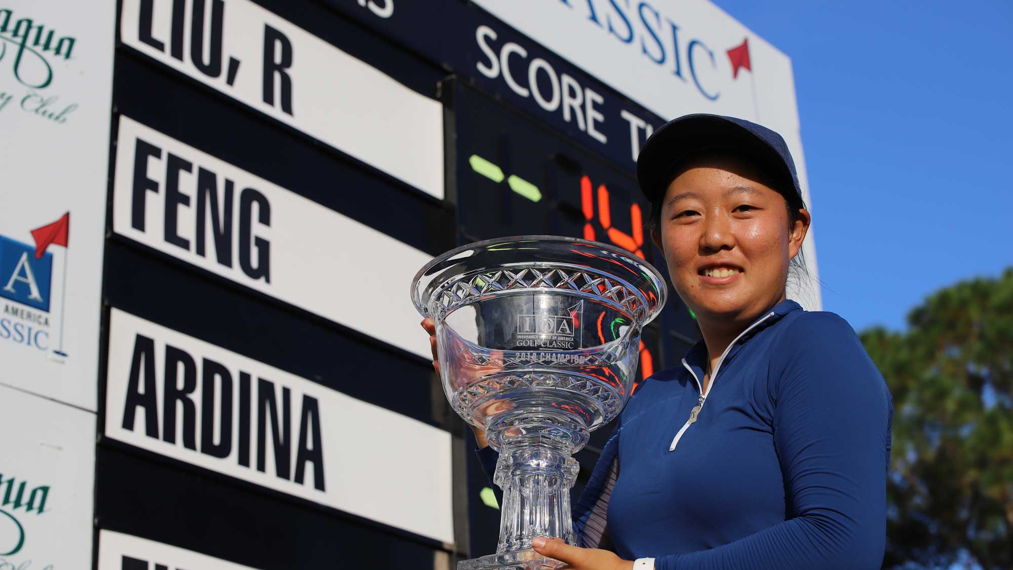 ruixin-liu-with-trophy-at-leaderboard-2000x1125.jpg