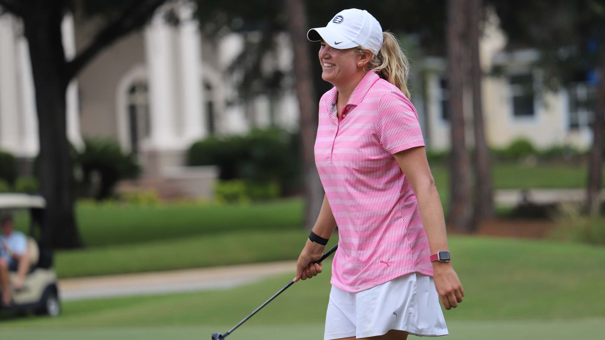 Laura Wearn smiling after winning the 2020 IOA Golf Classic