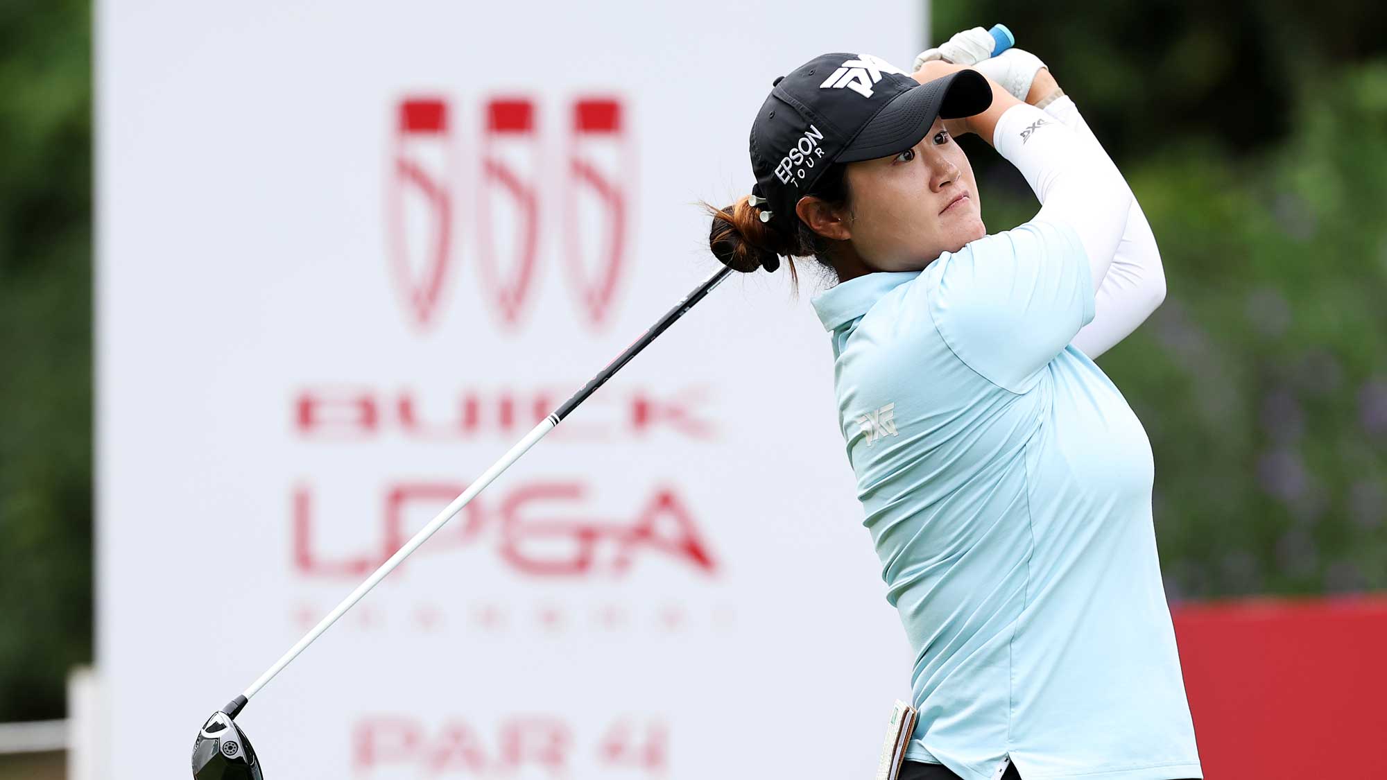 Gina Kim of the United States plays a shot from the first tee during the first round of the Buick LPGA Shanghai 2026 at Sheshan Golf Club on October 15, 2026 in Shanghai, China.